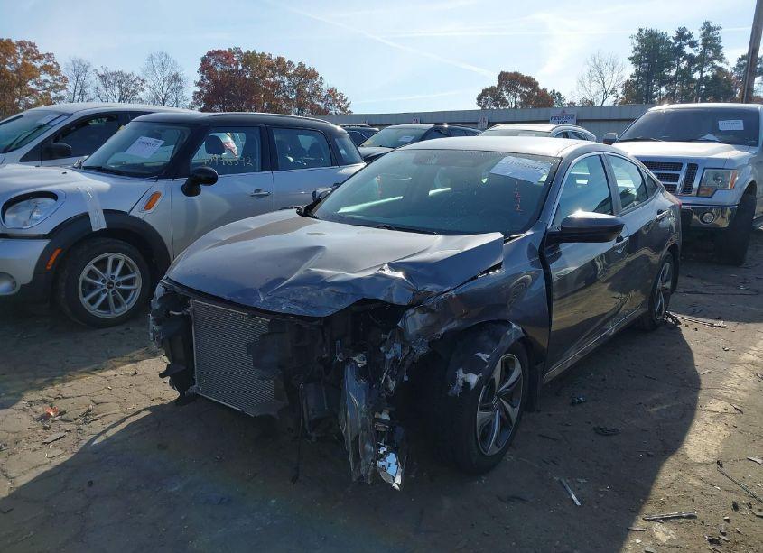 Photo 2 of 2019 Honda Civic LX (VIN 19XFC2F65KE011272)