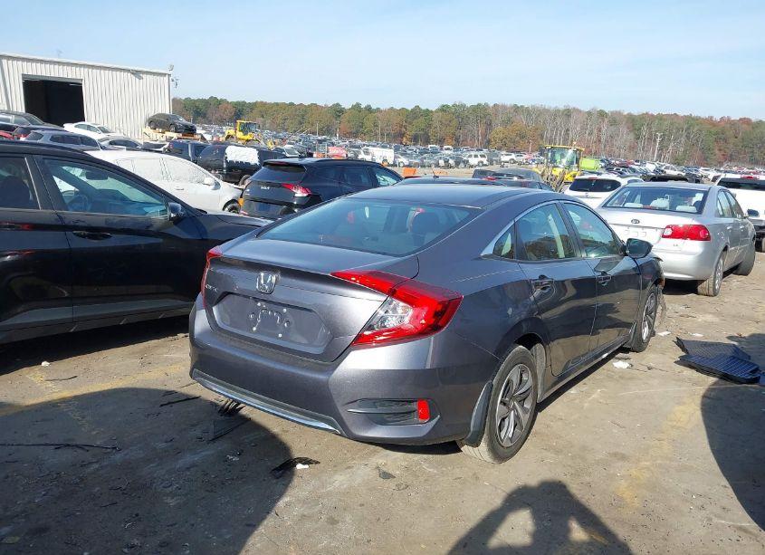 Photo 4 of 2019 Honda Civic LX (VIN 19XFC2F65KE011272)