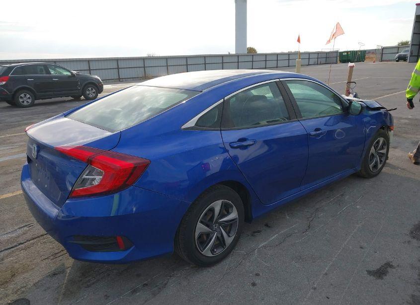 Photo 4 of 2019 Honda Civic LX (VIN 19XFC2F65KE013877)