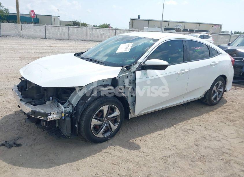 Photo 2 of 2019 Honda Civic LX (VIN 19XFC2F65KE015967)