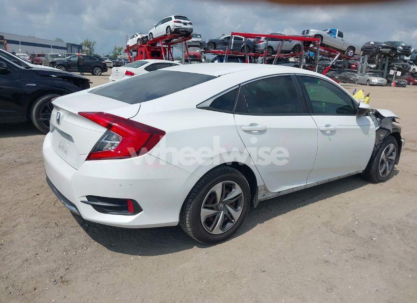 Photo 4 of 2019 Honda Civic LX (VIN 19XFC2F65KE015967)
