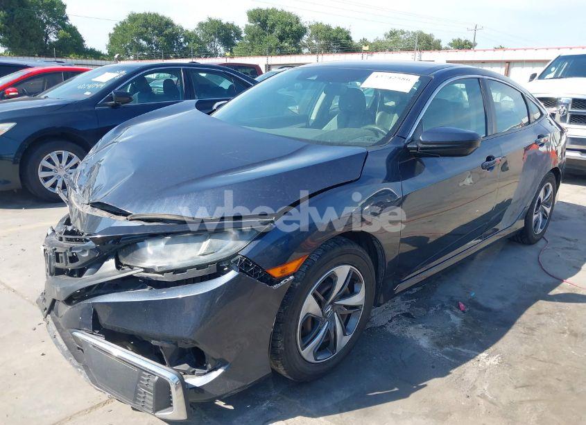 Photo 2 of 2019 Honda Civic LX (VIN 19XFC2F65KE027701)