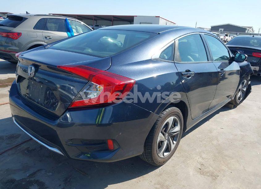 Photo 4 of 2019 Honda Civic LX (VIN 19XFC2F65KE027701)