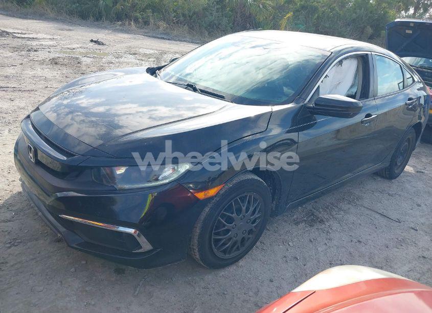 Photo 2 of 2019 Honda Civic LX (VIN 19XFC2F65KE029450)