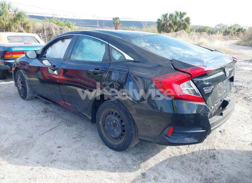 Photo 3 of 2019 Honda Civic LX (VIN 19XFC2F65KE029450)