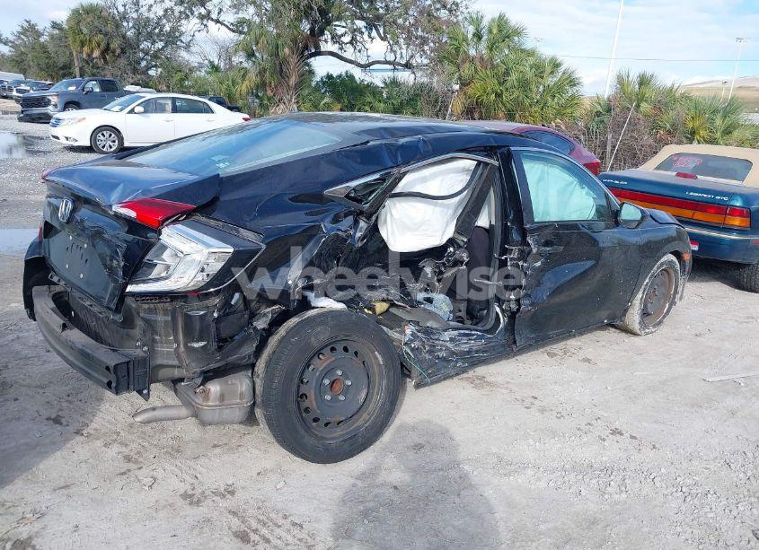 Photo 4 of 2019 Honda Civic LX (VIN 19XFC2F65KE029450)