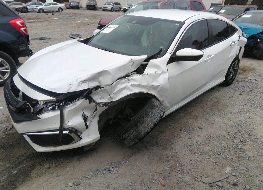 Photo 2 of 2019 Honda Civic LX (VIN 19XFC2F65KE033174)