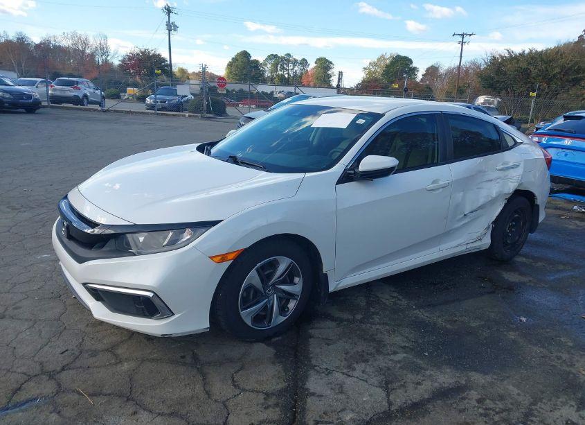 Photo 2 of 2019 Honda Civic LX (VIN 19XFC2F65KE033692)