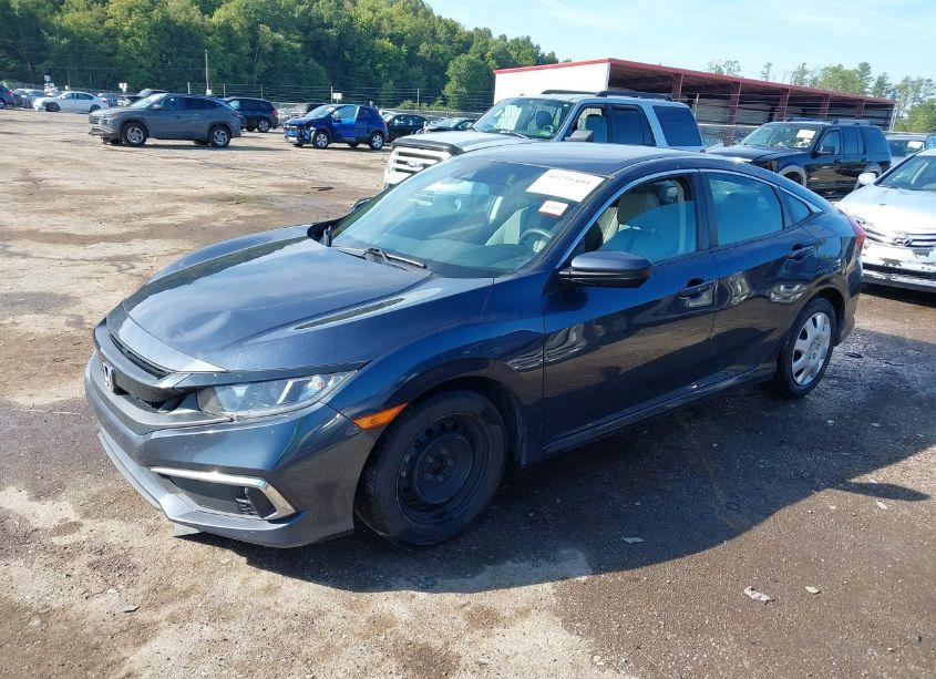 Photo 2 of 2019 Honda Civic LX (VIN 19XFC2F65KE034521)