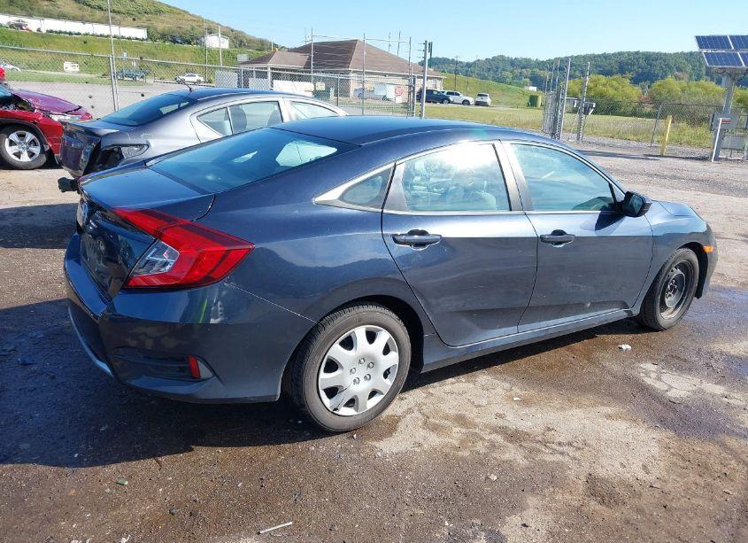 Photo 4 of 2019 Honda Civic LX (VIN 19XFC2F65KE034521)