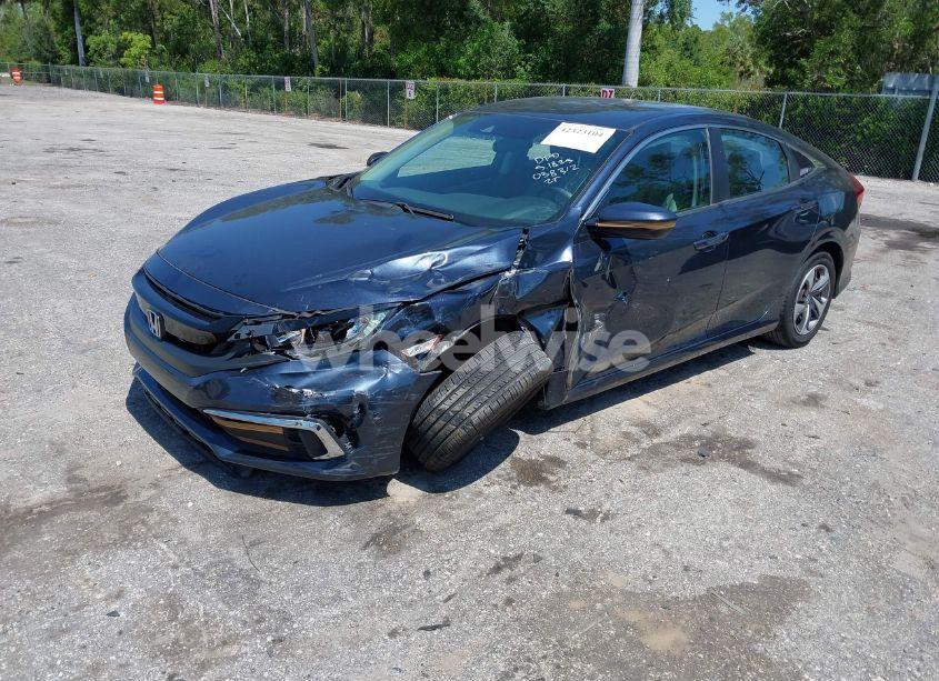 Photo 2 of 2019 Honda Civic LX (VIN 19XFC2F65KE038312)