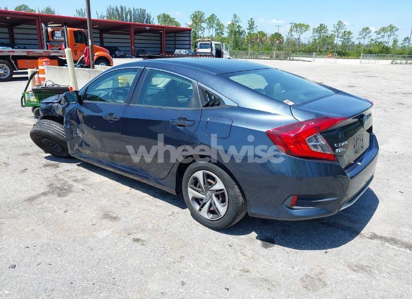 Photo 3 of 2019 Honda Civic LX (VIN 19XFC2F65KE038312)