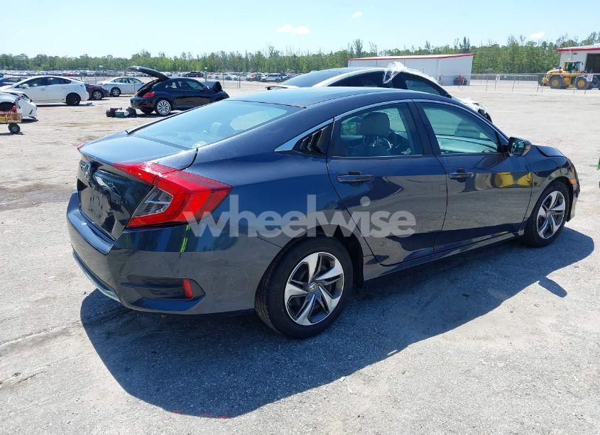 Photo 4 of 2019 Honda Civic LX (VIN 19XFC2F65KE038312)
