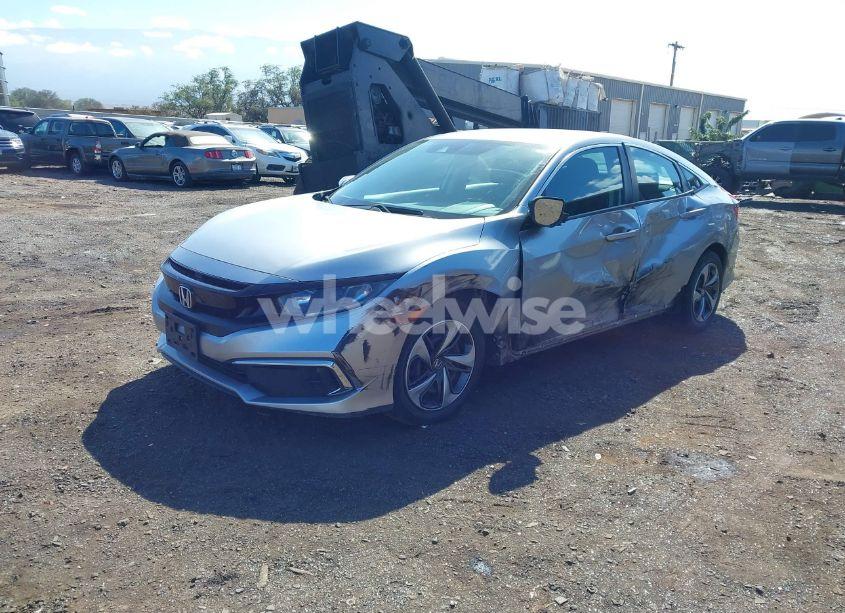 Photo 2 of 2019 Honda Civic LX (VIN 19XFC2F65KE044871)