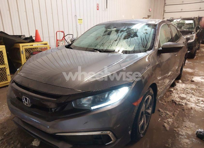Photo 2 of 2020 Honda Civic LX (VIN 19XFC2F65LE030888)