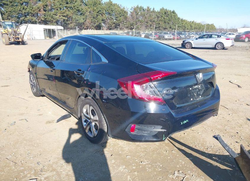 Photo 3 of 2019 Honda Civic LX (VIN 19XFC2F66KE029456)