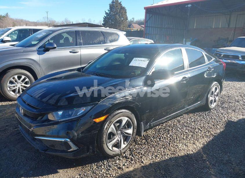 Photo 2 of 2019 Honda Civic LX (VIN 19XFC2F66KE047035)