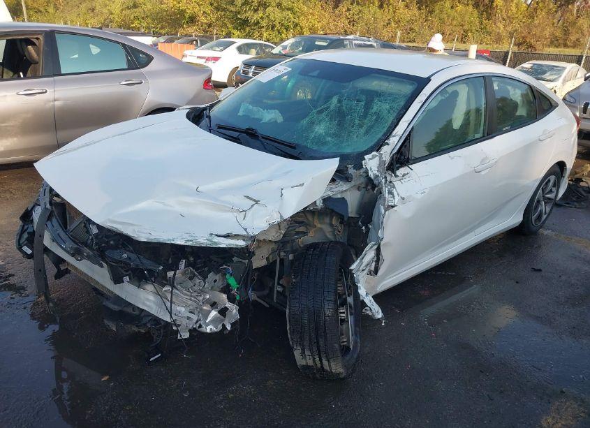 Photo 2 of 2020 Honda Civic LX (VIN 19XFC2F66LE016059)