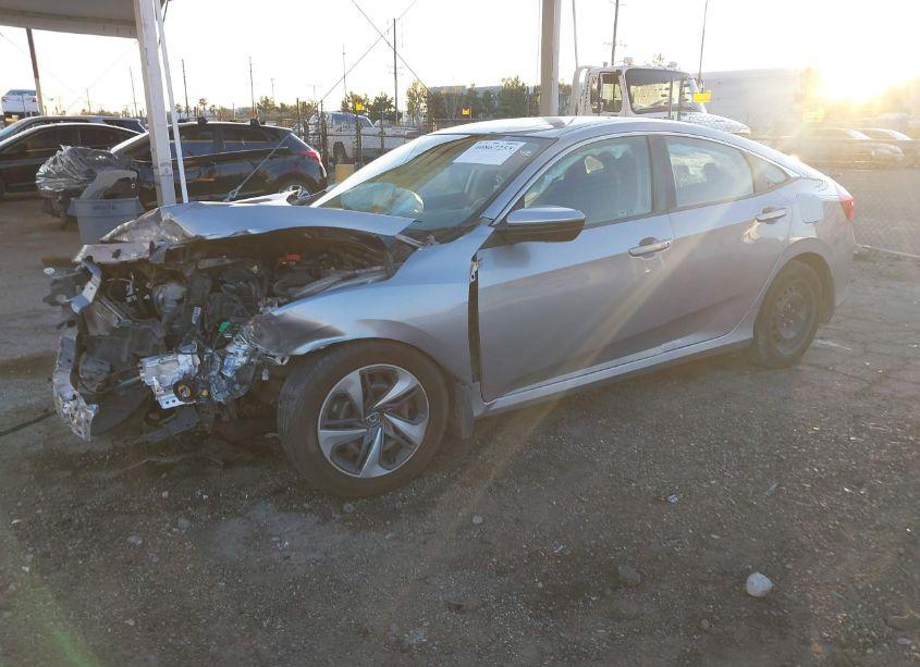 Photo 2 of 2020 Honda Civic LX (VIN 19XFC2F66LE207870)