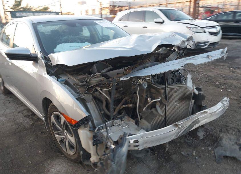 Photo 6 of 2020 Honda Civic LX (VIN 19XFC2F66LE207870)