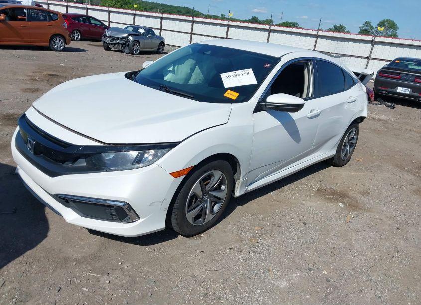 Photo 2 of 2019 Honda Civic LX (VIN 19XFC2F67KE009555)