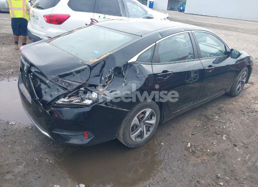 Photo 4 of 2019 Honda Civic LX (VIN 19XFC2F67KE011063)