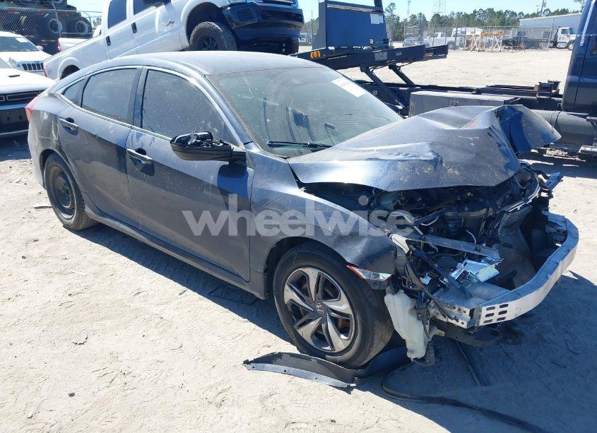 2019 Honda Civic LX (VIN 19XFC2F67KE040661) main photo