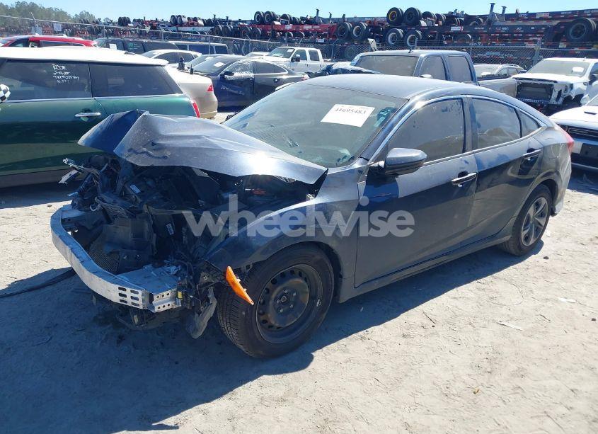 Photo 2 of 2019 Honda Civic LX (VIN 19XFC2F67KE040661)