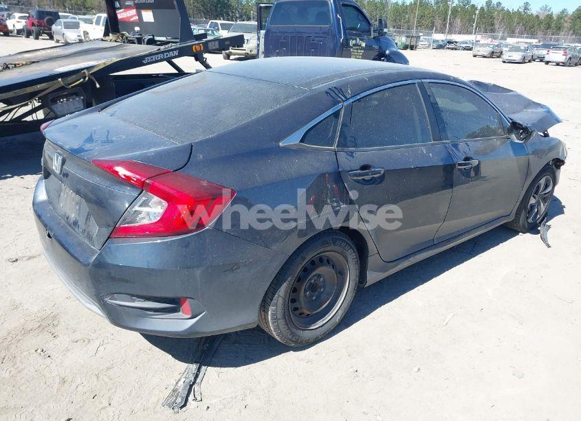 Photo 4 of 2019 Honda Civic LX (VIN 19XFC2F67KE040661)