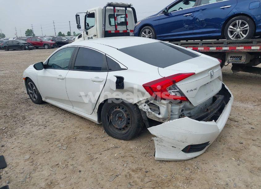 Photo 3 of 2019 Honda Civic LX (VIN 19XFC2F67KE210503)