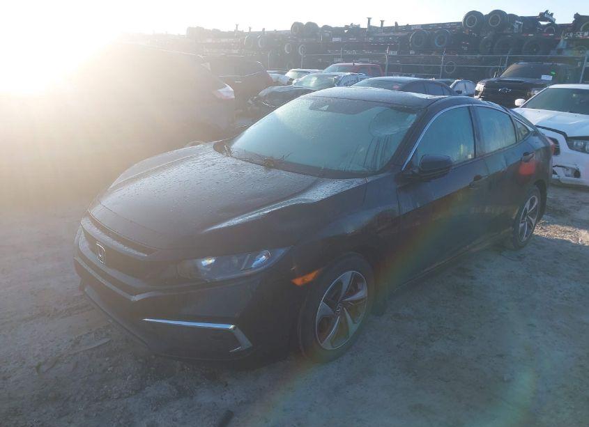 Photo 2 of 2020 Honda Civic LX (VIN 19XFC2F67LE003997)