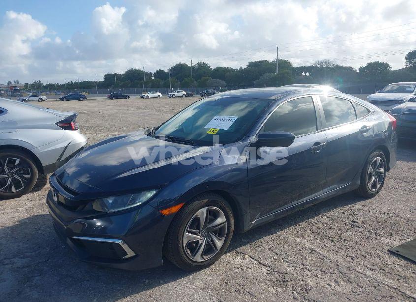 Photo 2 of 2020 Honda Civic LX (VIN 19XFC2F67LE016023)