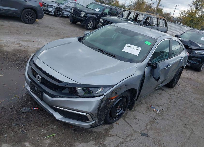 Photo 2 of 2020 Honda Civic LX (VIN 19XFC2F67LE027474)