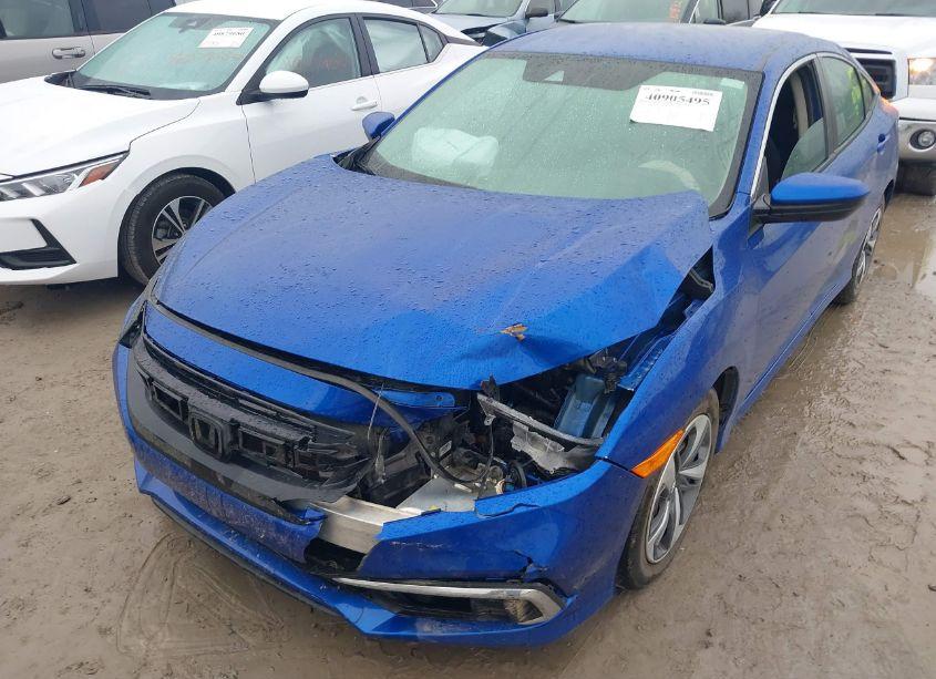 Photo 6 of 2019 Honda Civic LX (VIN 19XFC2F68KE002761)