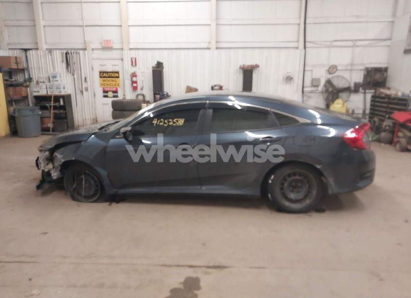 Photo 14 of 2019 Honda Civic LX (VIN 19XFC2F68KE033377)