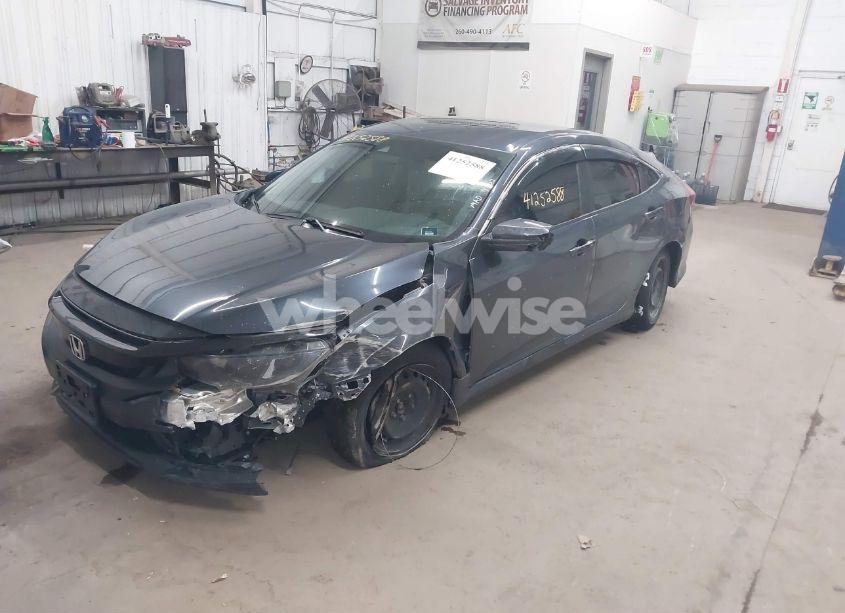 Photo 2 of 2019 Honda Civic LX (VIN 19XFC2F68KE033377)