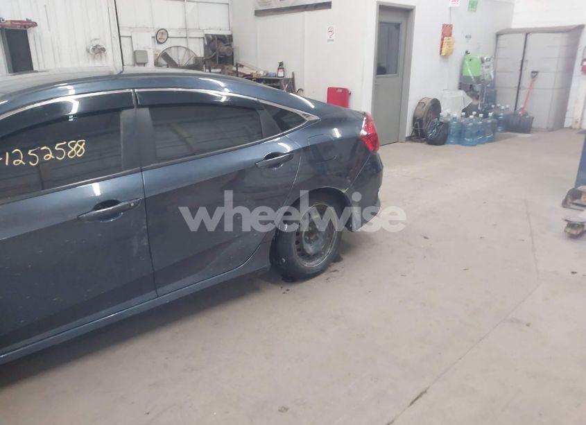 Photo 6 of 2019 Honda Civic LX (VIN 19XFC2F68KE033377)