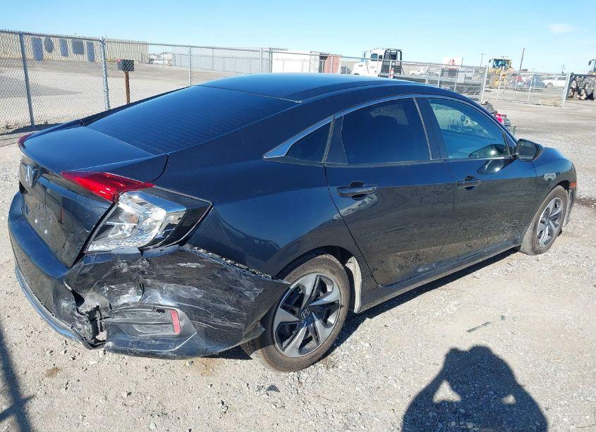 Photo 4 of 2019 Honda Civic LX (VIN 19XFC2F68KE200949)