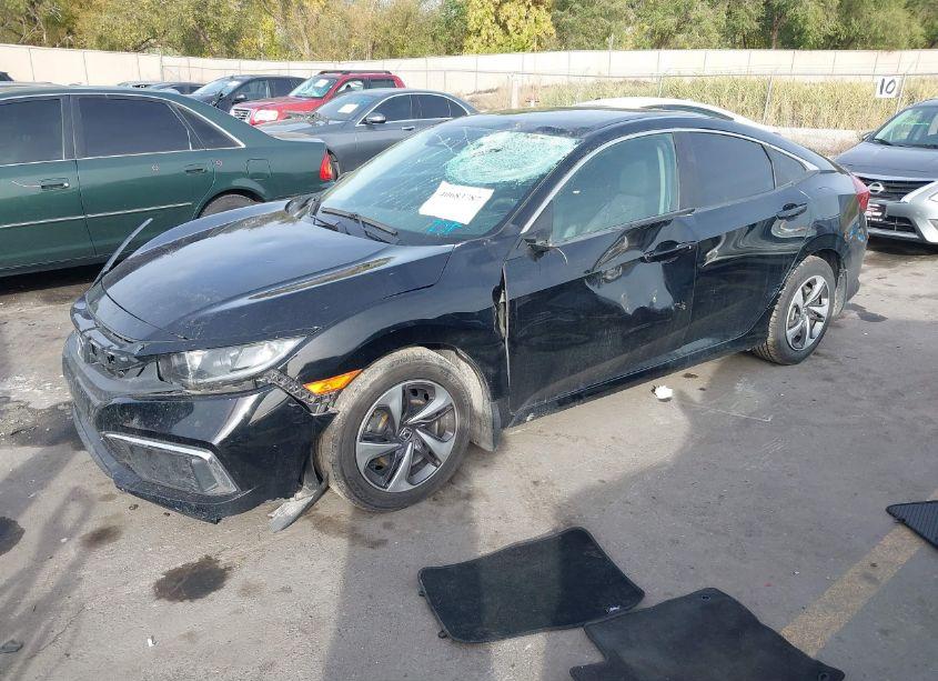 Photo 2 of 2019 Honda Civic LX (VIN 19XFC2F68KE203852)