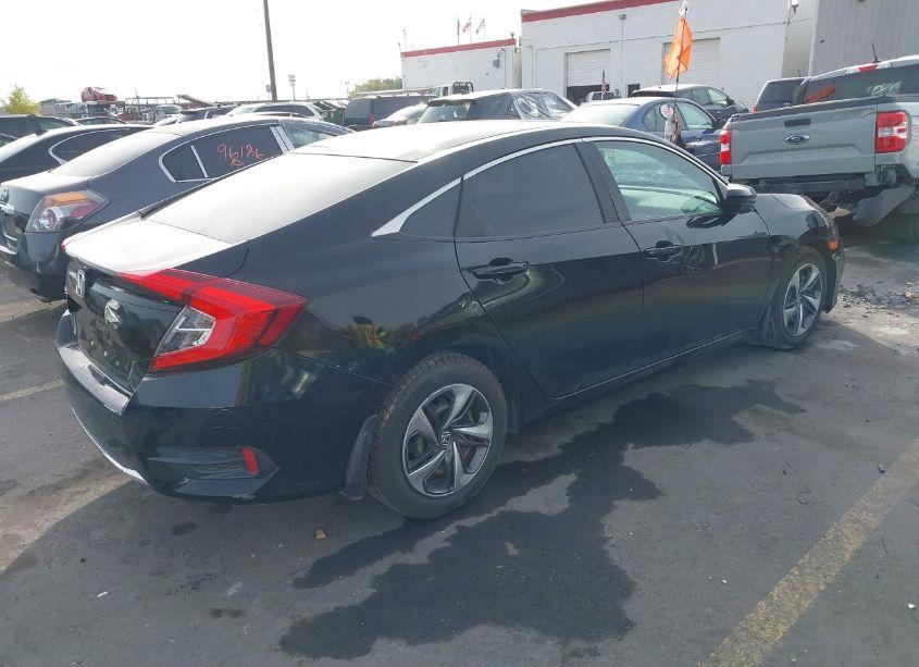 Photo 4 of 2019 Honda Civic LX (VIN 19XFC2F68KE203852)