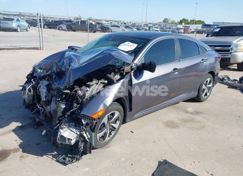 Photo 2 of 2020 Honda Civic LX (VIN 19XFC2F68LE023059)