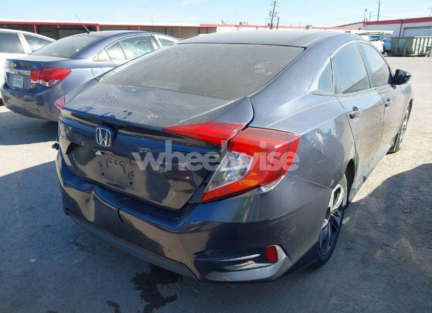 Photo 4 of 2020 Honda Civic LX (VIN 19XFC2F68LE201584)