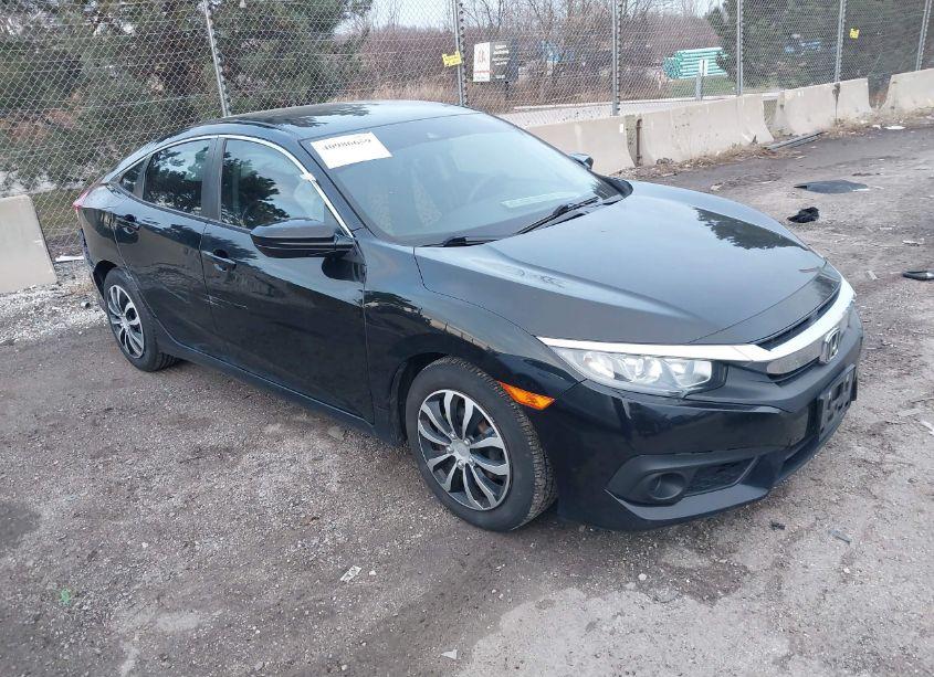 2018 Honda Civic LX (VIN 19XFC2F69JE026243) main photo