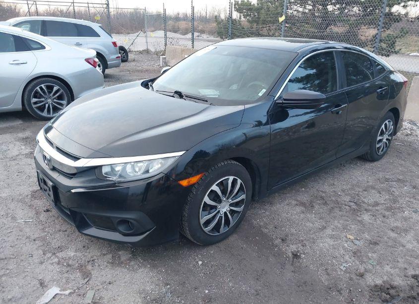 Photo 2 of 2018 Honda Civic LX (VIN 19XFC2F69JE026243)