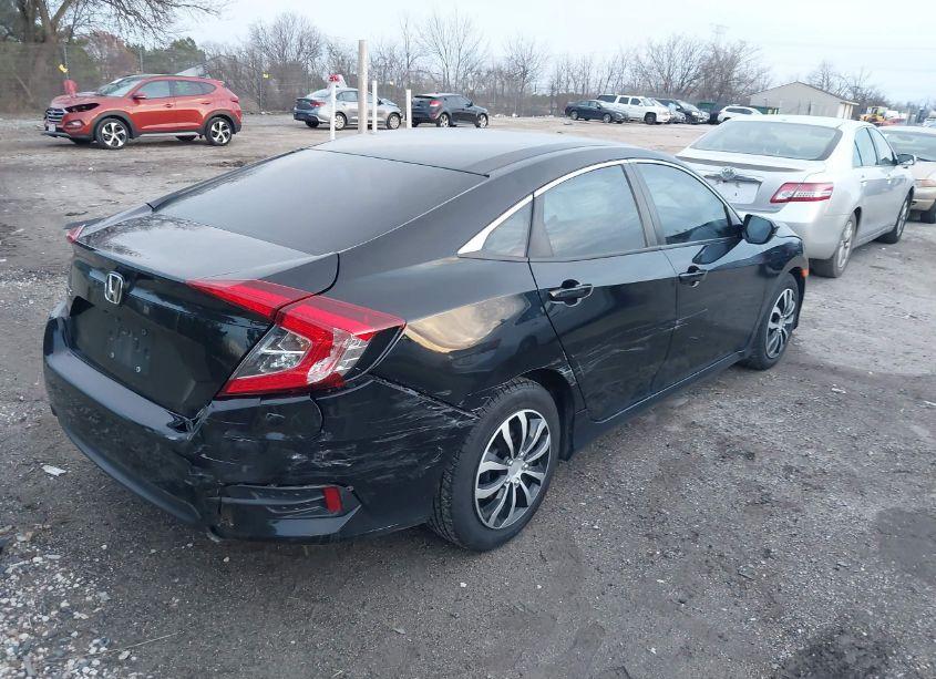 Photo 4 of 2018 Honda Civic LX (VIN 19XFC2F69JE026243)