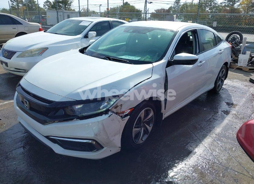 Photo 2 of 2019 Honda Civic LX (VIN 19XFC2F69KE013994)