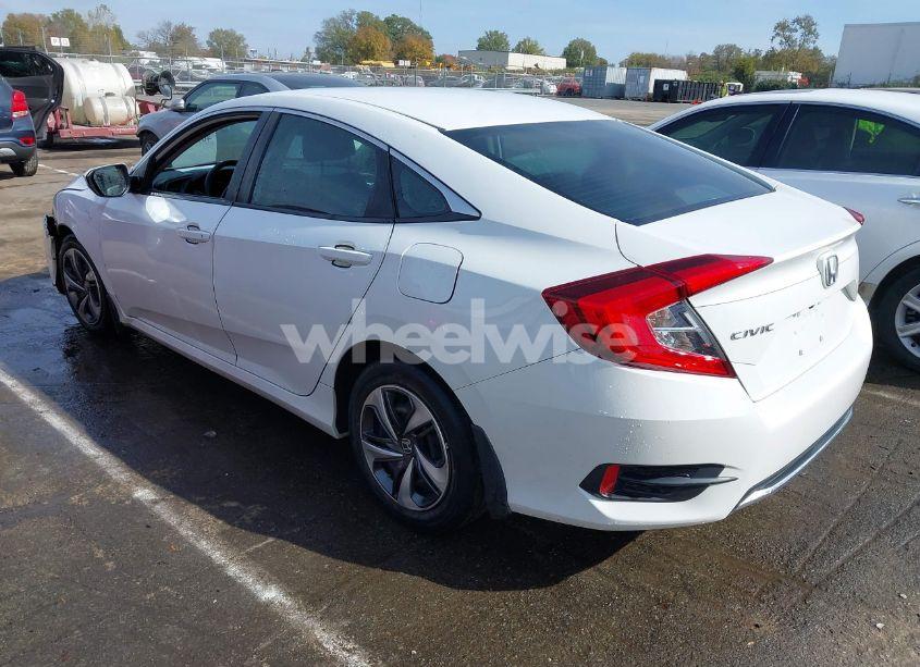 Photo 3 of 2019 Honda Civic LX (VIN 19XFC2F69KE013994)