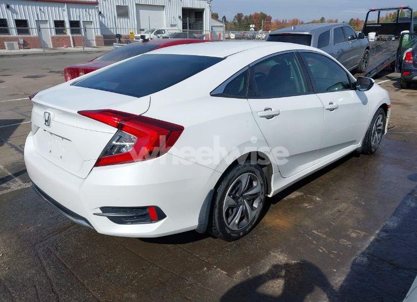 Photo 4 of 2019 Honda Civic LX (VIN 19XFC2F69KE013994)