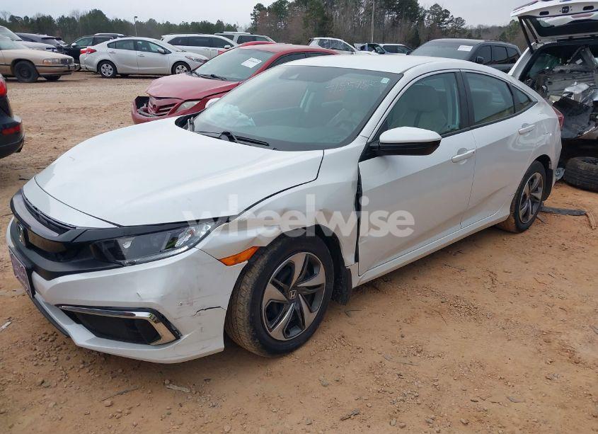 Photo 2 of 2019 Honda Civic LX (VIN 19XFC2F69KE037003)