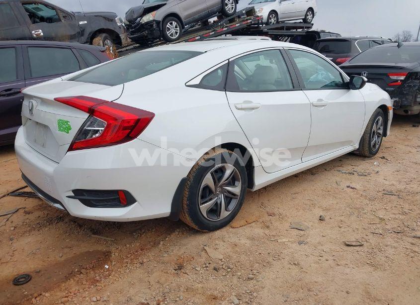 Photo 4 of 2019 Honda Civic LX (VIN 19XFC2F69KE037003)
